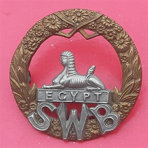 The South Wales Borderers Edwardian Bi Metal Cap Badge Steady The