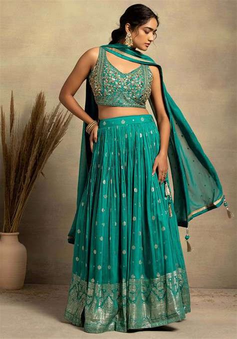 Buy Women Turquoise Brocade Silk Lehenga Set With Embellished Blouse