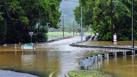 Emergency crews search for car caught in flood waters in Cairns | The ...