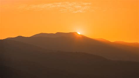 Download wallpaper 1920x1080 sunset, mountains, distance, valley, sky ...