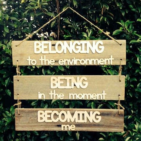 Being Belonging Becoming Sign That Is Made From Wood And Reflects What