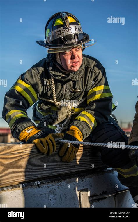 A Probationary Firefighter In His Second Week Of Training At The New