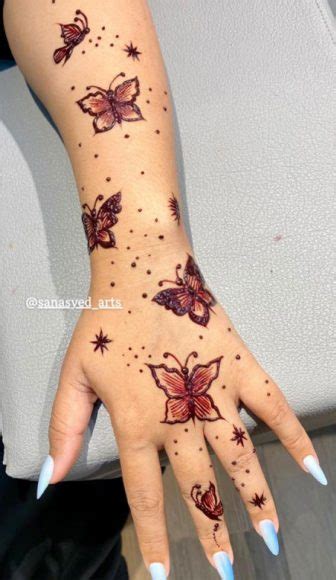 Fluttering Elegance 23 Enchanting Butterfly Henna Designs Elegance In