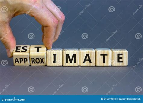 Estimate Or Approximate Symbol Businessman Turns Wooden Cubes And