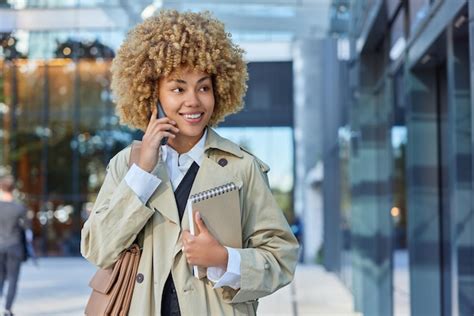 Premium Photo Blonde Curly Haired Woman Makes Phone Call Connects To
