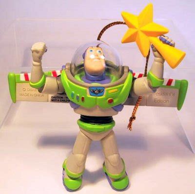 Buzz Lightyear holding yellow star tree topper ornament (Grolier) from ...