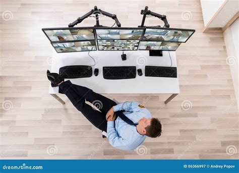 Security Guard Sleeping In Office Stock Image Image Of Cameras Chair