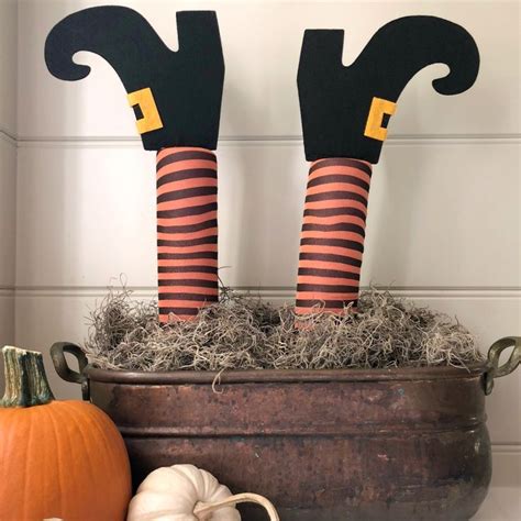 Dollar Tree Witch Legs- Make These Fun Witch Leg Stakes for Halloween | Easy halloween ...