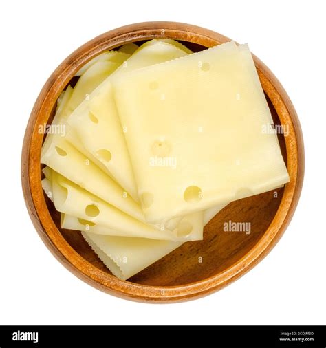 Emmental Cheese Slices In A Wooden Bowl Folded Slices Of Emmenthal Or