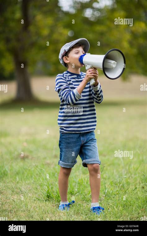 Boy Speaking On Megaphone Stock Photo Alamy