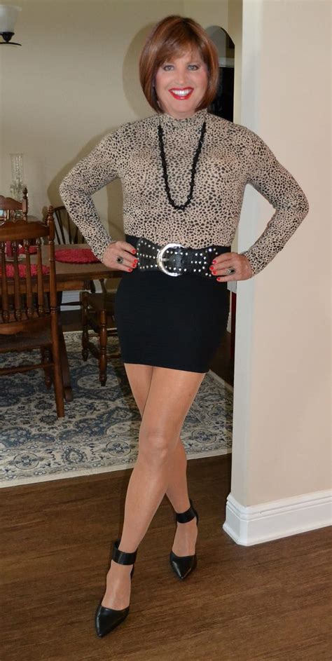 I Will Always Love Spandex Mini Skirts Paired With Thin Snug Fitting Turtle Neck Tops