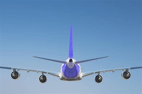 Premium Photo A Purple And White Airplane Is Flying In The Sky