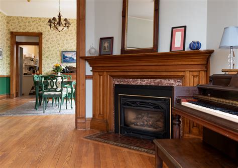 piano room fireplace | The William Henry Miller Inn