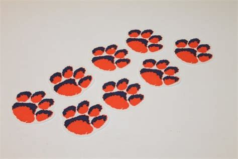 Items similar to 8 Auburn Tiger Paw Print Iron On Appliques on Etsy