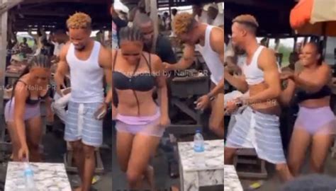 Uproar As Lady Strips Naked In Market After Losing A Bottle Flip Challenge