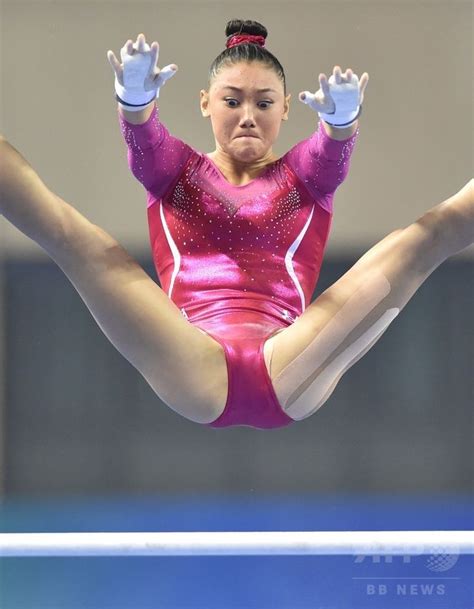 Kyla Ross Of The Us Performs On The Uneven Bars During The Womens All