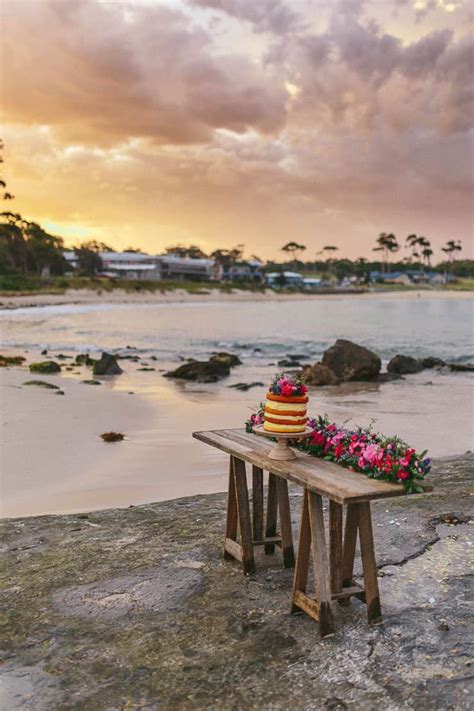 Floral Infused Beach Wedding Inspiration Naked Cake Bright Flowers Sunset The Wedding Playbook