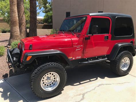 lifted 1999 Jeep Wrangler 4×4 for sale