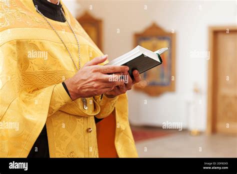 Orthodox Church Christianity Priest Hands Holding Holy Bible Book In