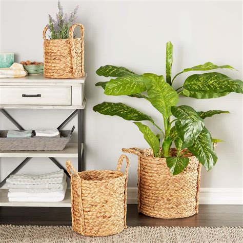 Litton Lane Seagrass Handmade Woven Storage Basket With Handles Set Of 3 84428 The Home Depot