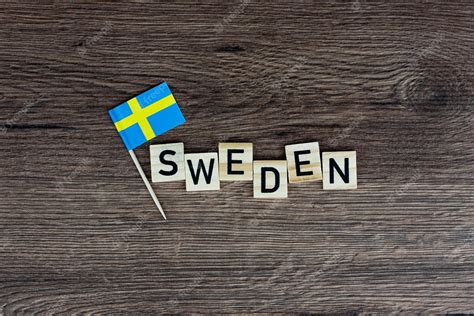 Premium Photo Sweden Wooden Word With Swedish Flag Wooden Letters