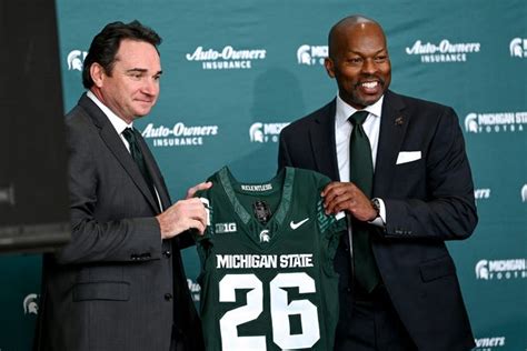 Photos: Michigan State’s football coach Jonathan Smith introduced