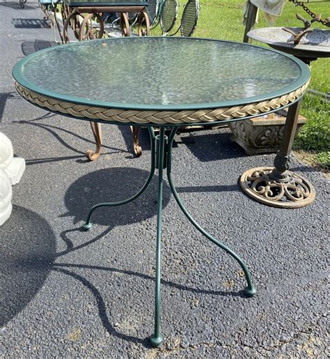 0573 Metal And Glass Top Patio Table Sec October Online 2021