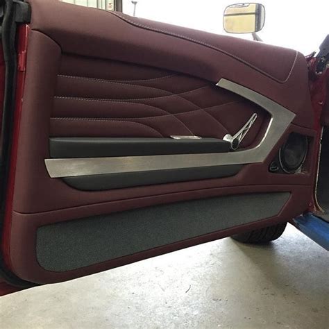 Curvy Leather Work Lines On A Restomod Door Panel With Brushed Aluminum