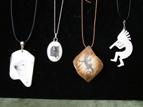 SCRIMSHAW PENDANTS « Jessie Ghere Feather