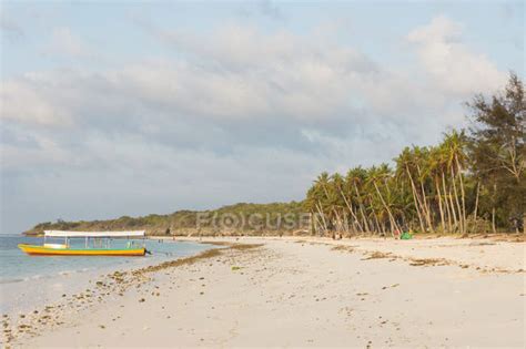 Indonesia, Sulawesi Selatan, Bulukumba, Beach of Bira, boat by sandy ...