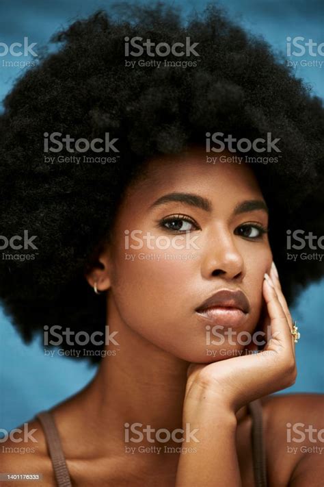 Closeup Of A Young African Model Touching Her Face Portrait Of A Confident Woman With A Flawless