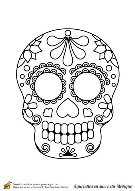 Una calavera de azúcar mexicana con pétalos de flores para colorear