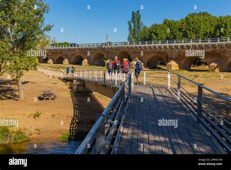 Pilgrims Walk Along The Camino De Santiago Stock Photo Alamy