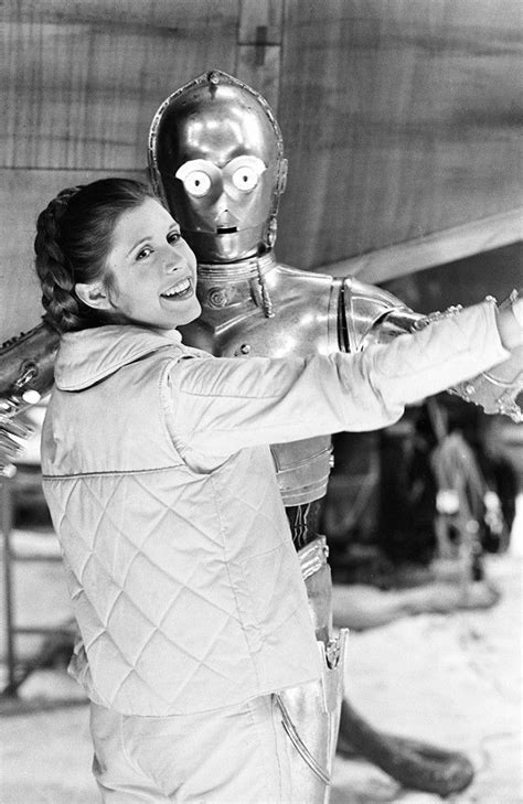 Carrie Fisher on the set of Star Wars | Star wars cast, Happy star wars ...