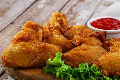 Fried chicken wings in batter — Stock Photo © koss13 #57858065