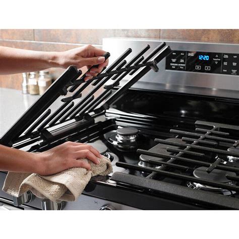 Whirlpool Gas Double Oven Range With Center Oval Burner In Stainless