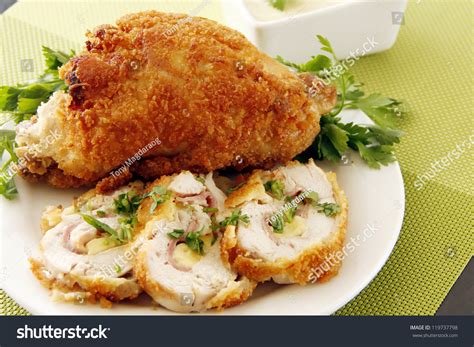 Stuffed Golden Fried Chicken Garnish With Vegetables Stock Photo