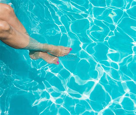 Woman Soaking Feet In The Swimming Pool Picture And Hd Photos Free