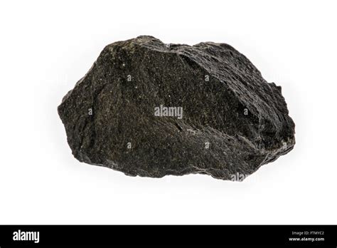 Basalt, extrusive igneous volcanic rock specimen on white background Stock Photo, Royalty Free ...