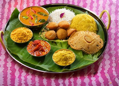 Premium Photo Onam Feast Eating Onasadya In Banana Leaf During The