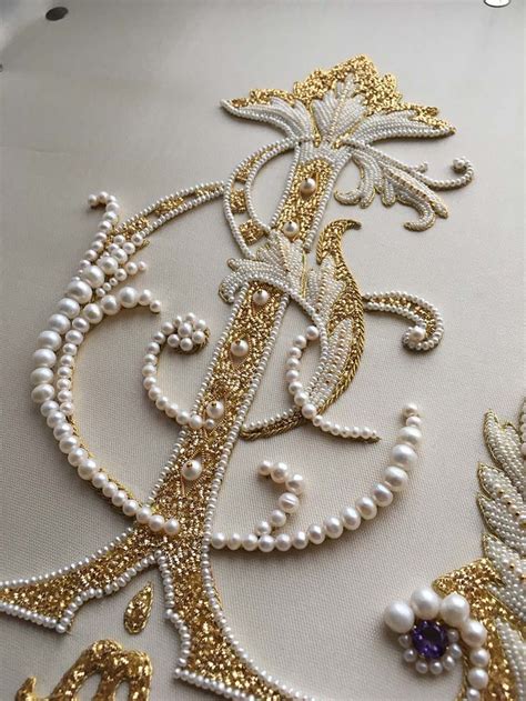 Detail Of Ornate Letter Pearl Embroidery Done By Larissa Borodich