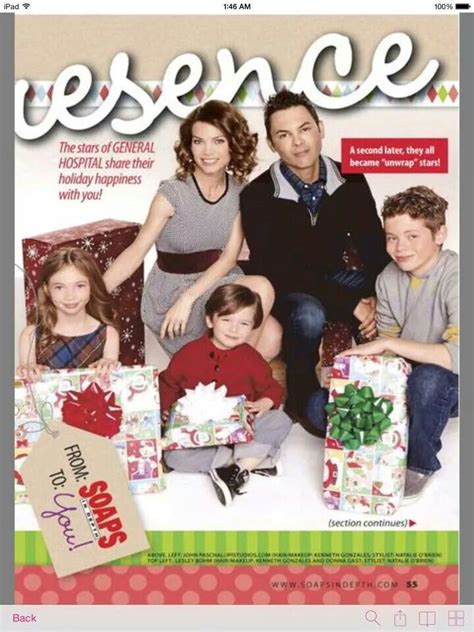 a magazine cover with a family holding presents