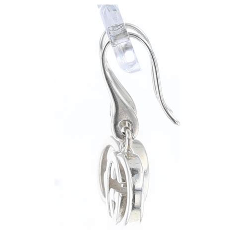 Gucci Boucles d oreilles G entrelacées en argent Argenté ref 798261