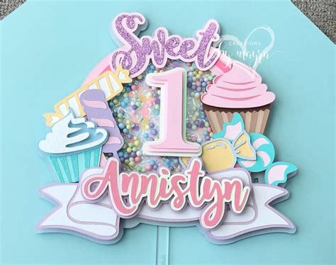 A Cake Topper That Says Sweet 1st Anniversary With Cupcakes And Sprinkles