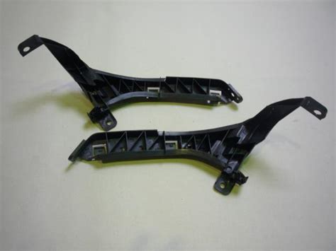 71190SWA000 Honda кронштейн бампера переднего левый