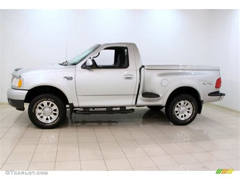 Silver Metallic 2001 Ford F150 XLT Regular Cab 4x4 Exterior Photo