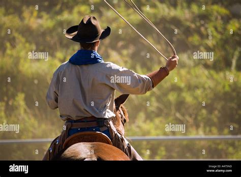 Cowboy with lasso Stock Photo - Alamy