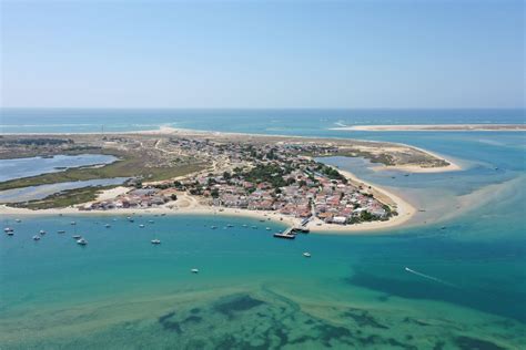 Quais são as praias do Algarve águas mais quentes