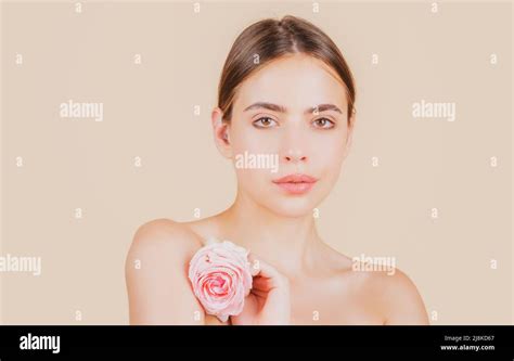 Beauty Woman Face With Natural Makeup And Rose Flowers Fresh Beauty