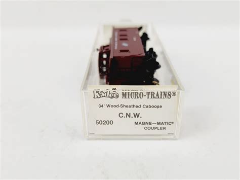 MICRO TRAINS N SCALE CHICAGO NORTH WESTERN 34 CABOOSE UNUSED NICE